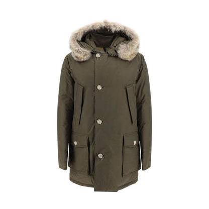 Woolrich Green Cotton Parka with fur hood, buttons, and pockets designed for AW25 season.