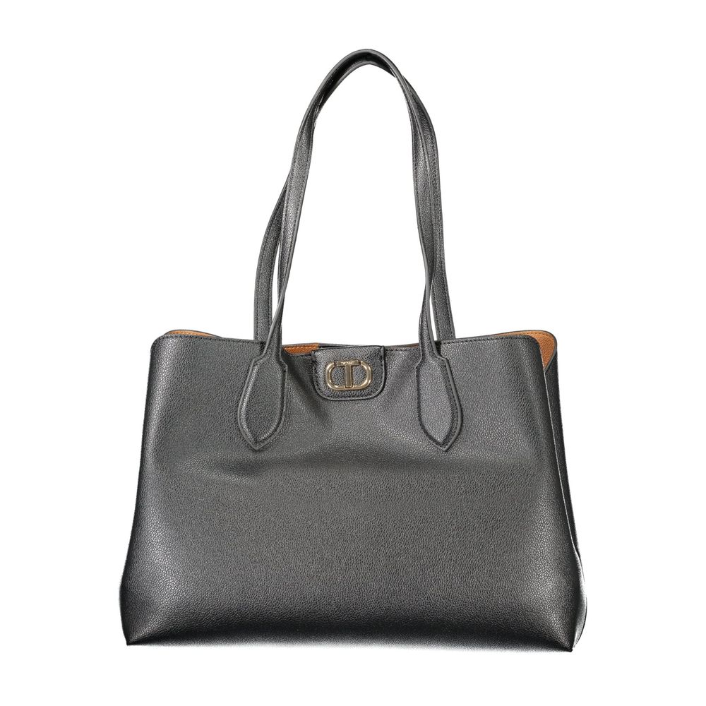 Front view with bag zipped and handles upright.