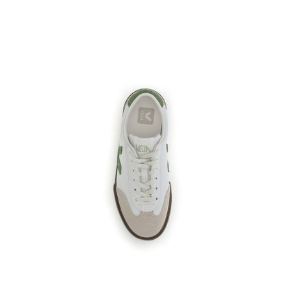 Top view of Veja White Leather Low Top Sneakers with lace-up design and green accents, inspired by 1970s Brazilian volleyball shoes.