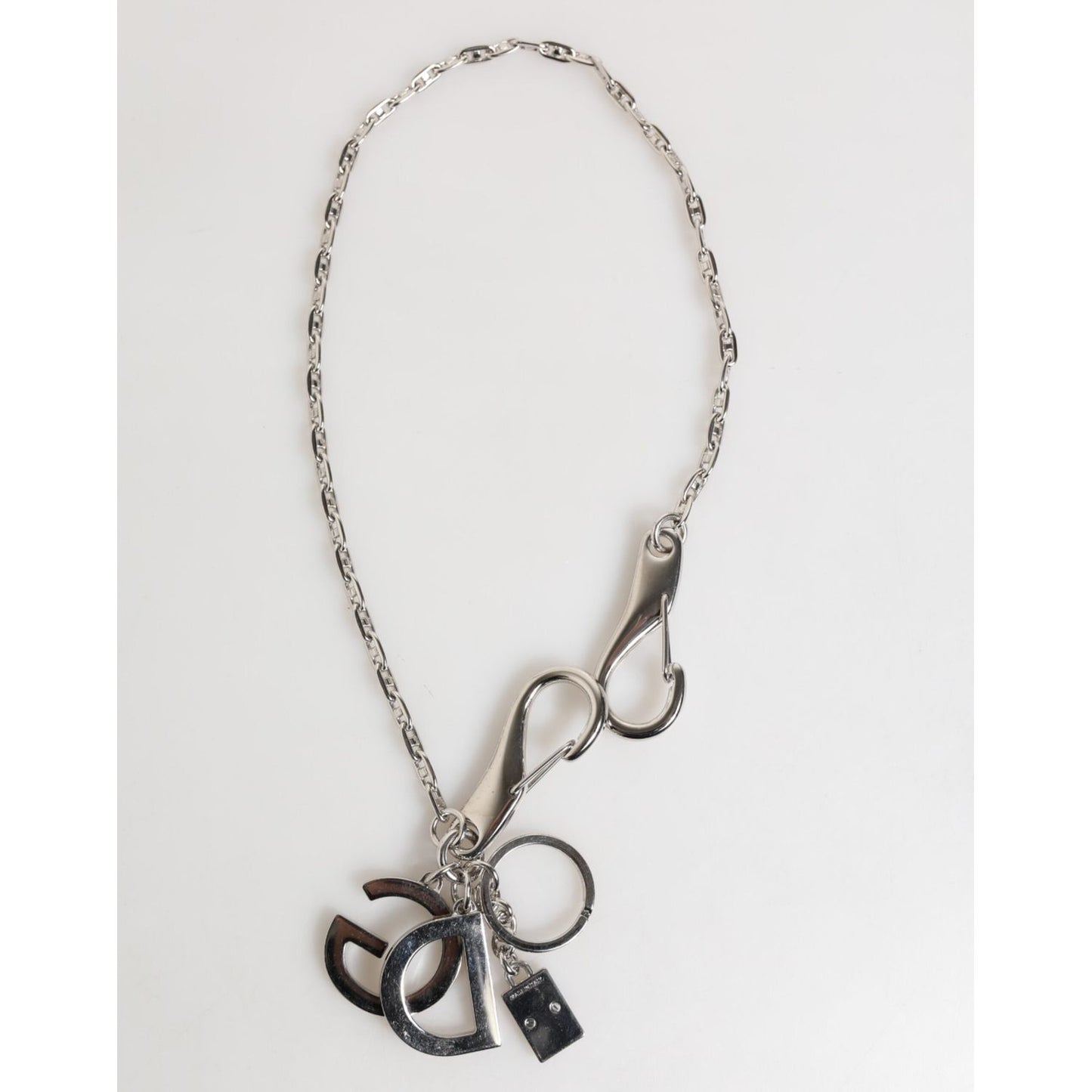Dolce & Gabbana Silver DG Logo Key Holder Keychain Bag Charm Keyring with lobster clasps and black DG logo charms in silver-tone metal.