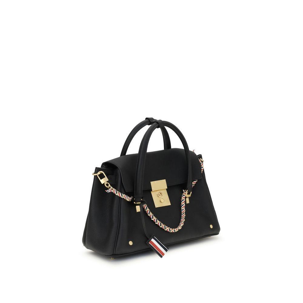 Front view with bag zipped and handles upright.