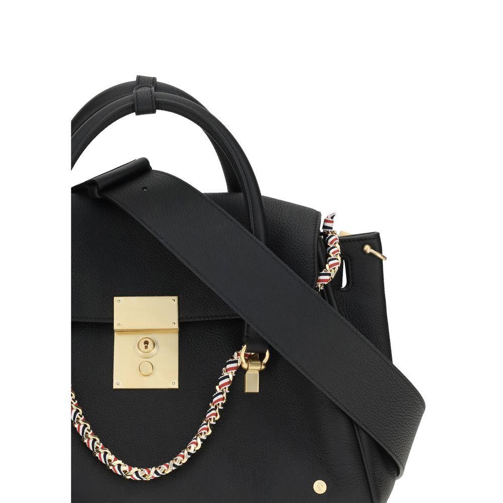 Front view with bag zipped and handles upright.