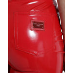 Dolce & Gabbana Red High Waist Skinny Trouser Shiny Pants with logo detail on back pocket, showing glossy finish and vibrant color.