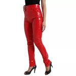 Dolce & Gabbana Red High Waist Skinny Trouser Shiny Pants with zipper closure and logo details, model in black top and heels.
