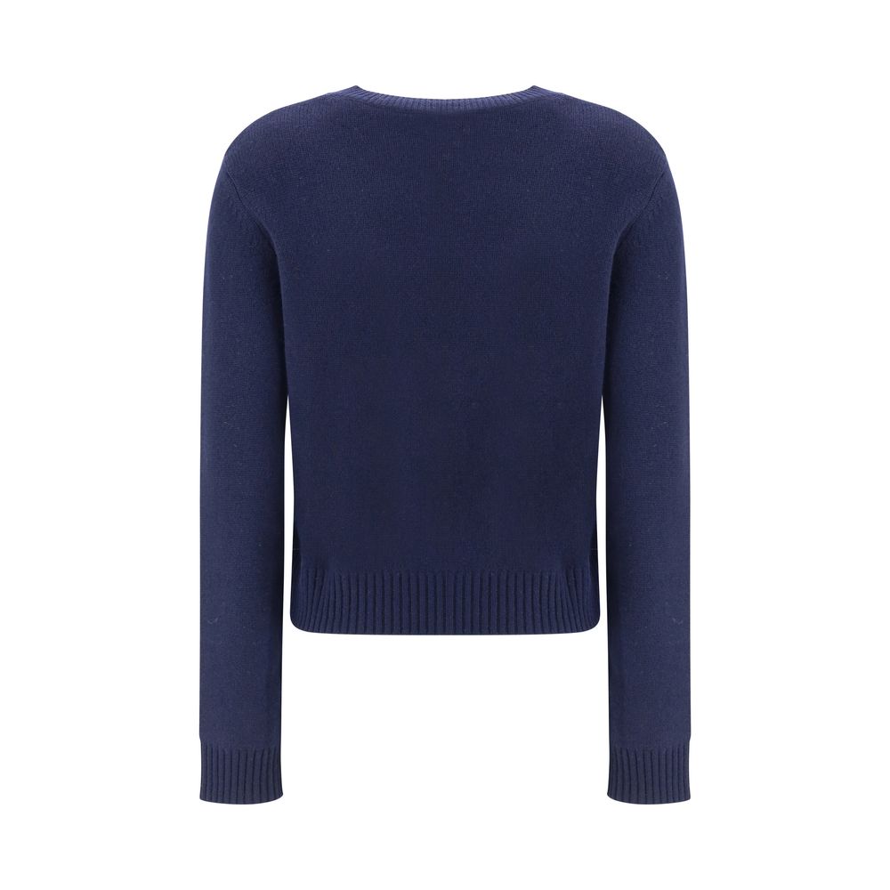 Lisa Yang Mable Sweater in blue cashmere with ribbed crew neck, cuffs, and hem, showcasing monochrome design. Ideal for elegant everyday wear.
