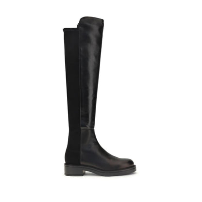 Stuart Weitzman Black Leather Over The Knee boots with block heel and elastic back for a versatile and sophisticated look.