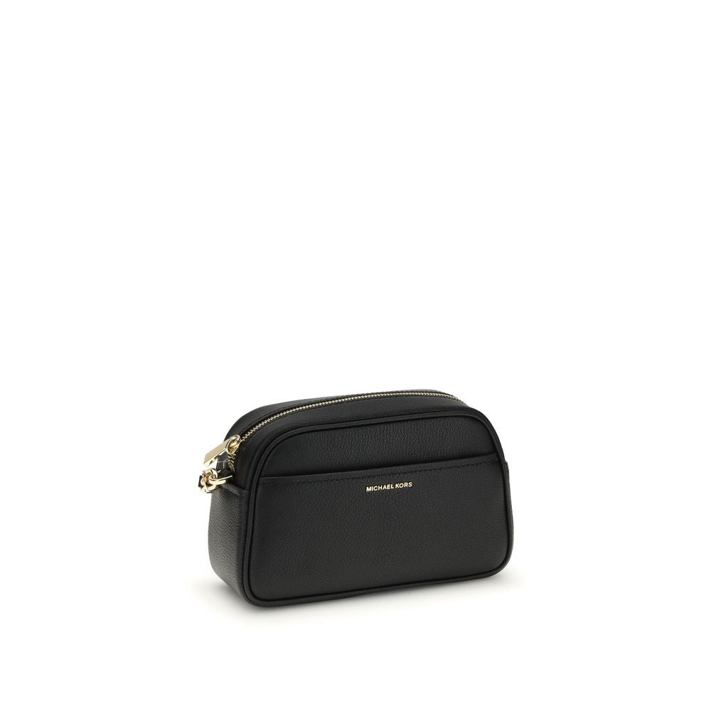 Michael Kors Jet Set Bag with gold-tone details and zip closure, featuring open front pocket and adjustable strap, AW25 collection.