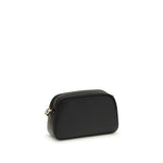 Michael Kors Jet Set Bag in black leather with gold-tone details, featuring a zip closure and adjustable shoulder strap.