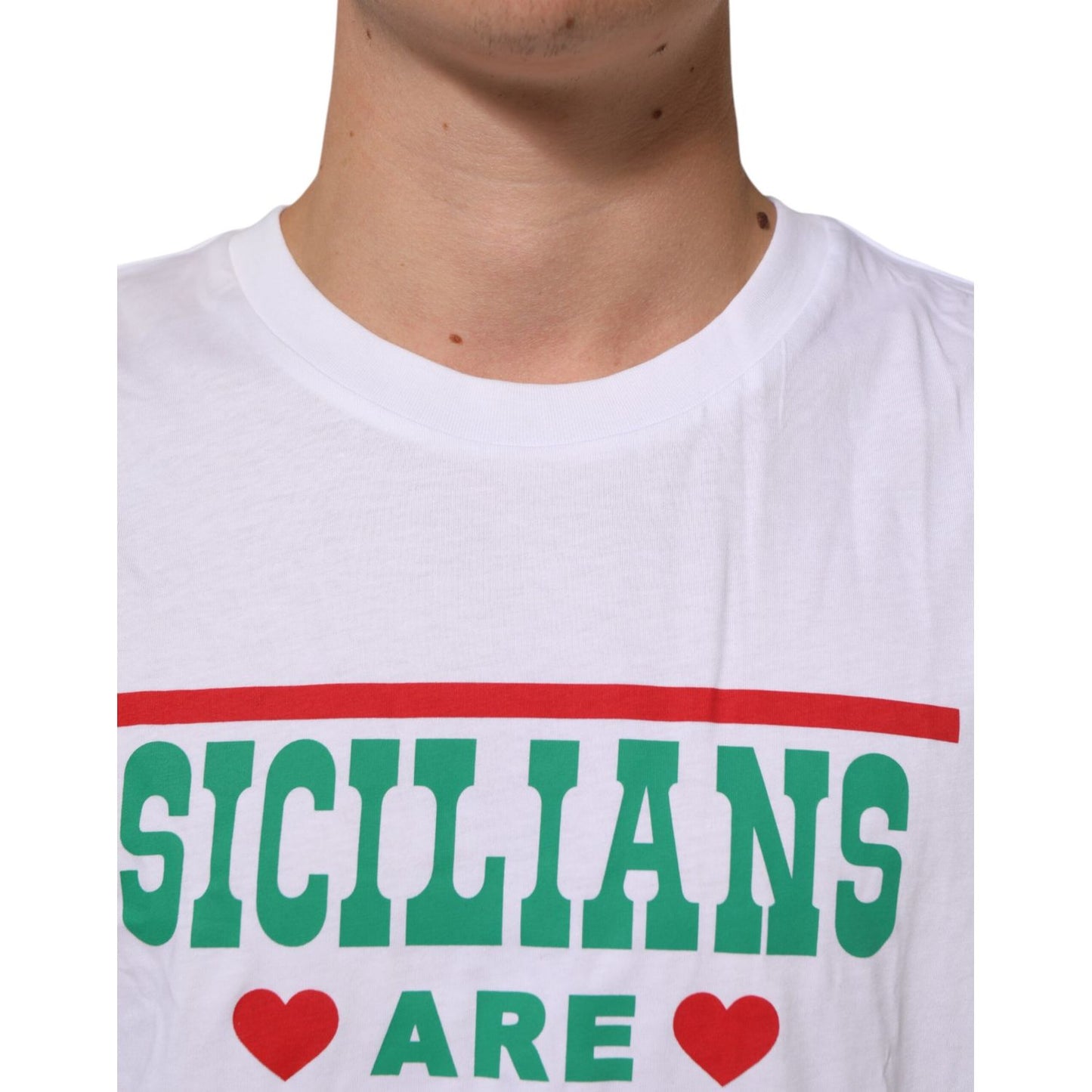Dolce & Gabbana White Graphic Print Cotton Crew Neck T-shirt with "Sicilians Are" text design, close-up view of front detail.