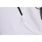 Close-up of Dolce & Gabbana White Sleeveless Round Neck Tank Top T-shirt neckline with tag, showing fabric details.