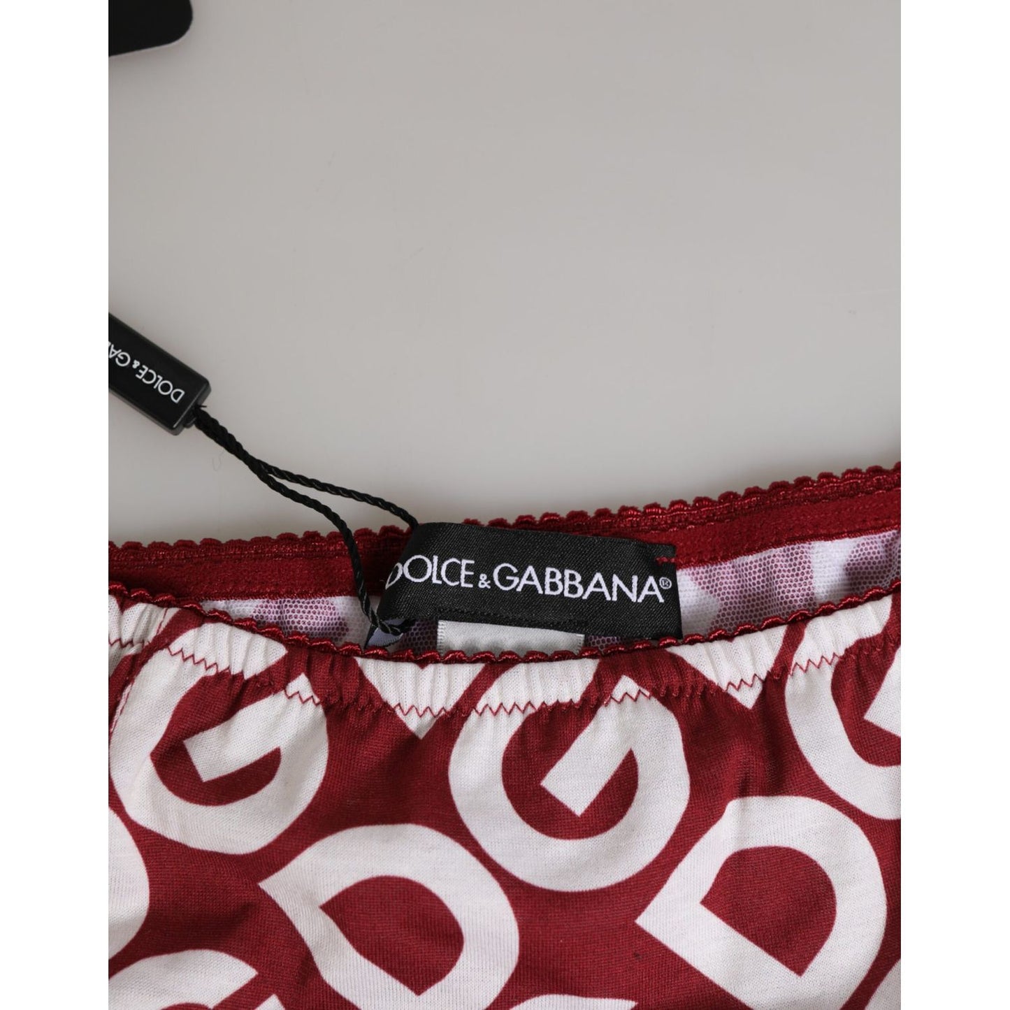 Dolce & Gabbana Bordeaux DG Logo Slip Bottom Brief Underwear with burgundy DG logo print close-up.