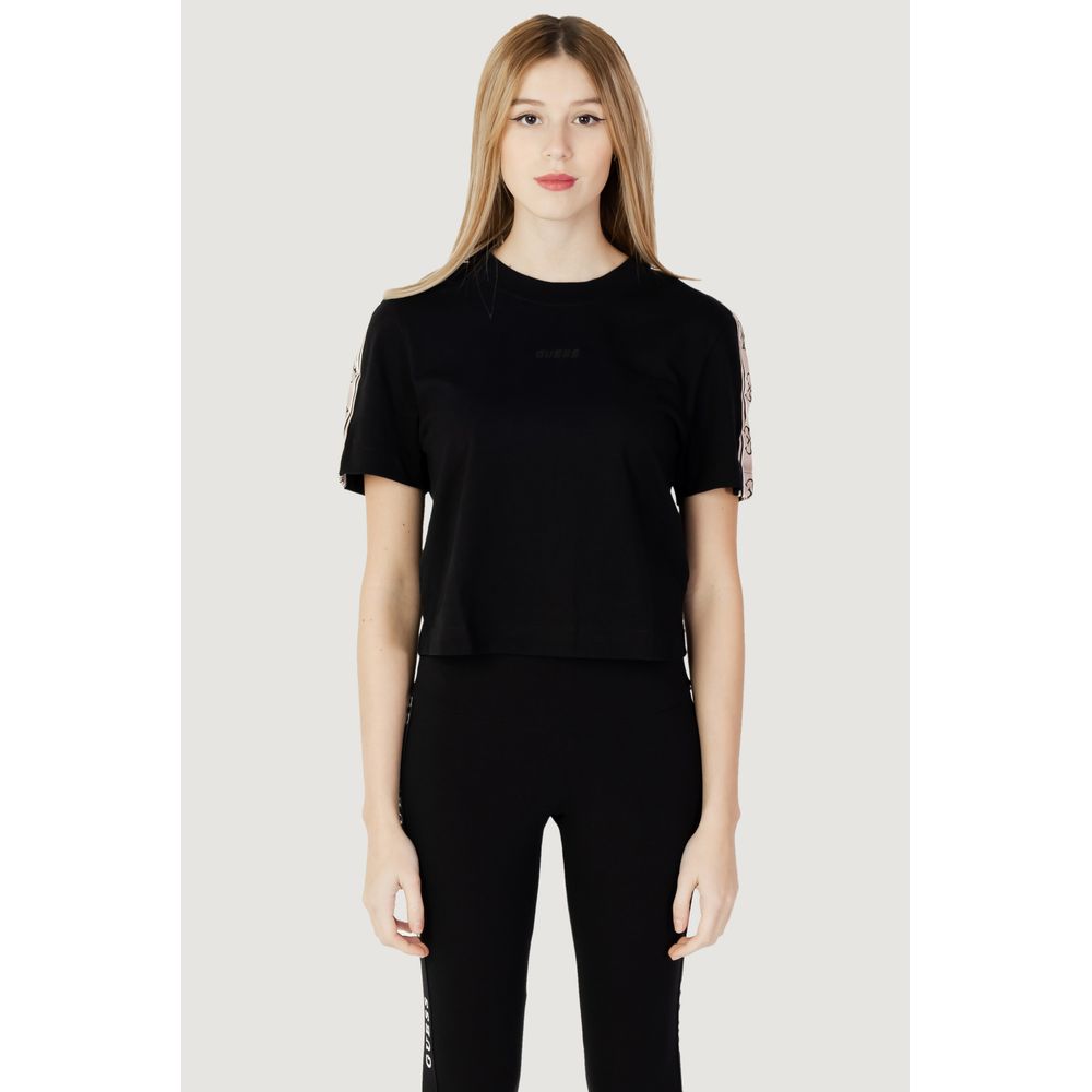Guess Active Black Cotton T-Shirt on model showcasing cropped design and short sleeves.