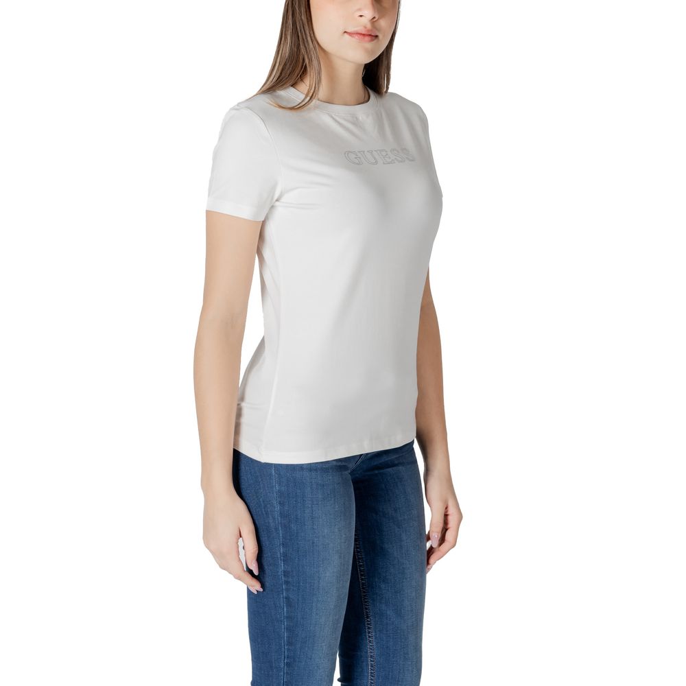Woman wearing Guess Active White Cotton T-Shirt paired with jeans, showcasing the stylish and comfortable design.