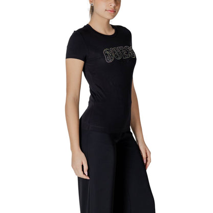 Woman wearing Guess Black Cotton T-Shirt with lace logo detail, showcasing a slim fit design.