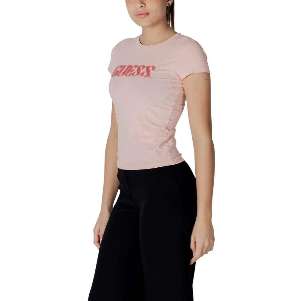 Woman wearing Guess Multicolor Cotton T-Shirt with pony hair logo and short sleeves, modern and feminine design.