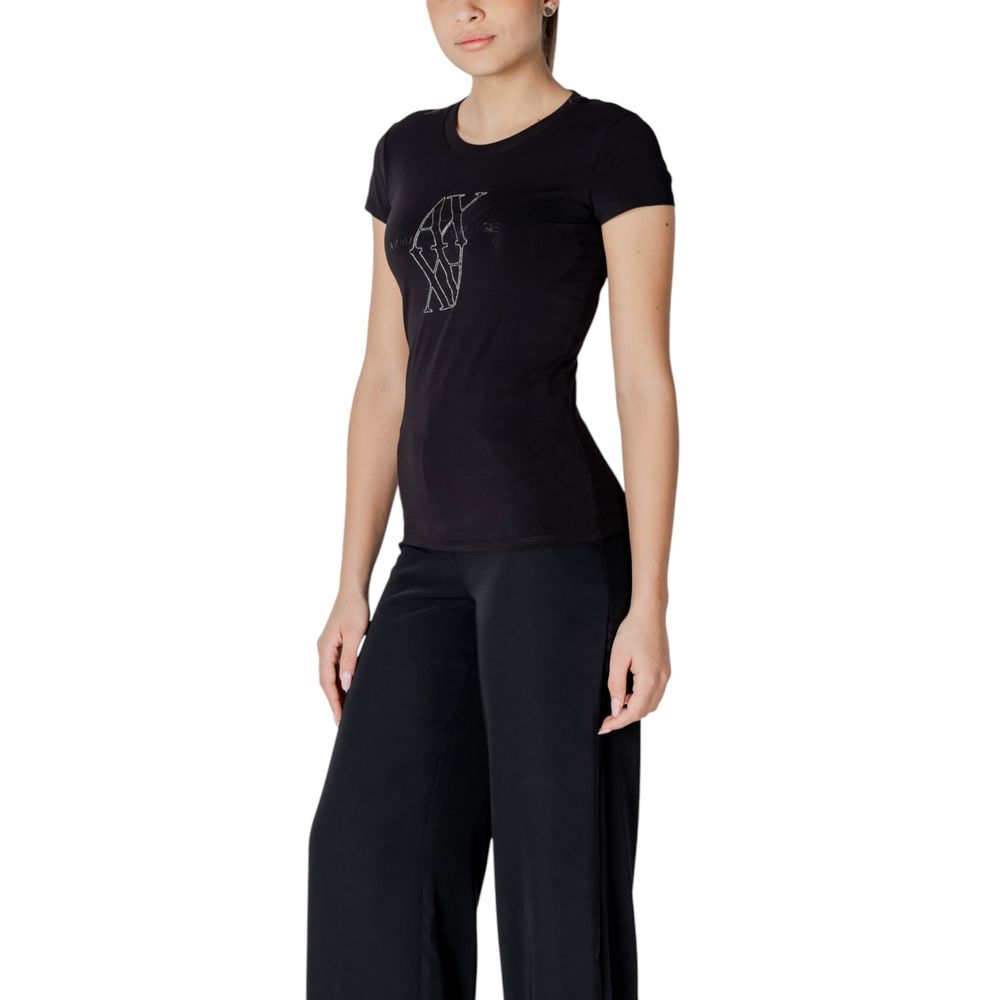Woman wearing Armani Exchange Black Cotton T-Shirt with logo, slim fit design, shown from front, enhancing silhouette.