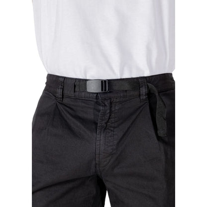 Close-up of Hugo Boss Black Cotton Bermuda Shorts showcasing belt detail and comfortable fit with white shirt.