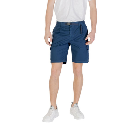 Man wearing Hugo Boss Blue Cotton Bermuda Shorts, showcasing comfort and fit for summer outings.