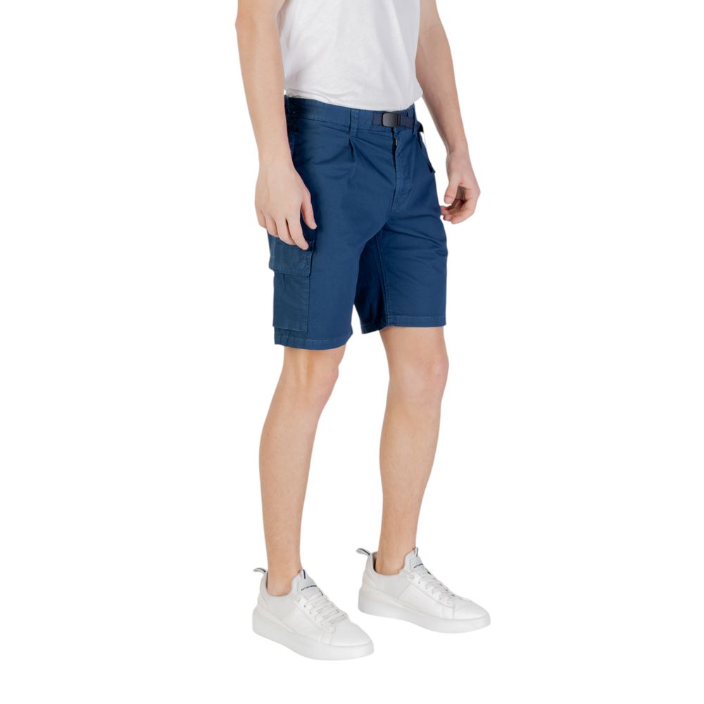Model wearing Hugo Boss Blue Cotton Bermuda Shorts for men, perfect for summer with 97% cotton, comfortable and versatile design.