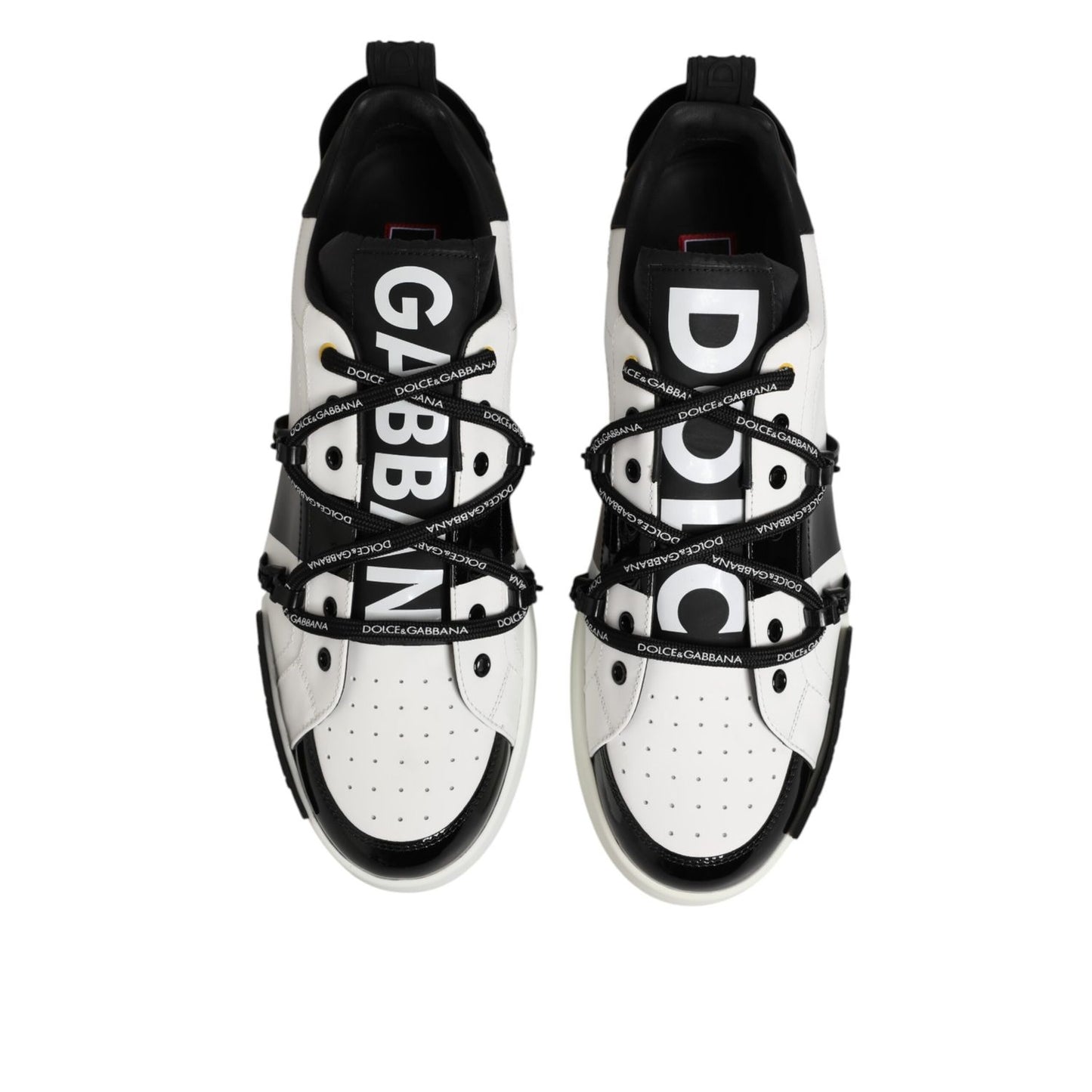 Dolce & Gabbana White Leather Logo Portofino Sneakers Shoes with black accents and logo detailing, top view.