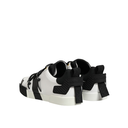 Dolce & Gabbana White Leather Logo Portofino Sneakers Shoes with black accents and lace-up design, view of heels and soles