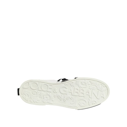 White sole of Dolce & Gabbana White Leather Logo Portofino Sneakers Shoes with embossed logo detailing.