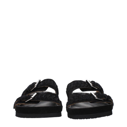 Isabel Marant Black Leather Slippers with silver buckle, rubber sole, and open toe design.