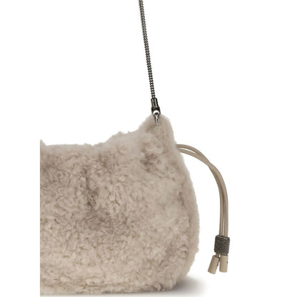 Close-up of Brunello Cucinelli Gray Fur Shoulder Bag with drawstring closure and nickel-free details.