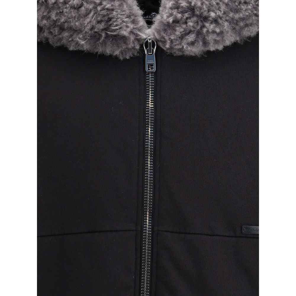 Dolce & Gabbana Black Cotton Sweatshirt with fur-trimmed hood and zip closure, showcasing elegant design details for AW25 season.