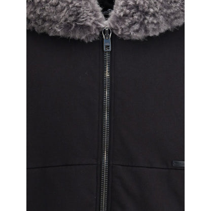 Dolce & Gabbana Black Cotton Sweatshirt with fur-trimmed hood and zip closure, showcasing elegant design details for AW25 season.