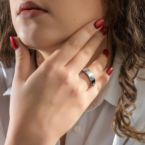 Woman wearing AN JEWELS JEWELRY Mod. AL.RWH01SC-9 ring with red nail polish and white blouse, showcasing elegant hand accessories.