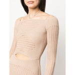 Beige ribbed-knit mini dress by ANDREĀDAMO Andrea Adamo with cut-out detailing and long sleeves, features a halterneck tie and open back.