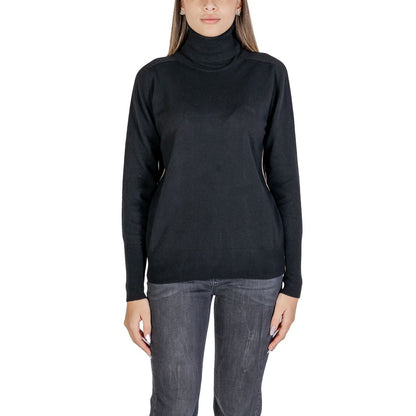 Woman wearing Alviero Martini Prima Classe Black Viscose Turtleneck sweater front view