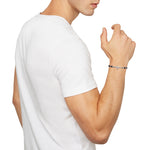 Gent wearing BREIL JEWELS Mod. TJ2989 bracelet, featuring a 925 silver design, shown in an official box.