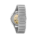 Back view of BULOVA Mod. CURV watch showcasing intricate mechanics and silver stainless steel bracelet.
