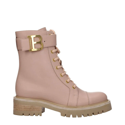 Balmain Beige Leather Ankle Boots with side logo, round toe, and lace-up closure. Sporty glam style with mid heels and rubber sole.