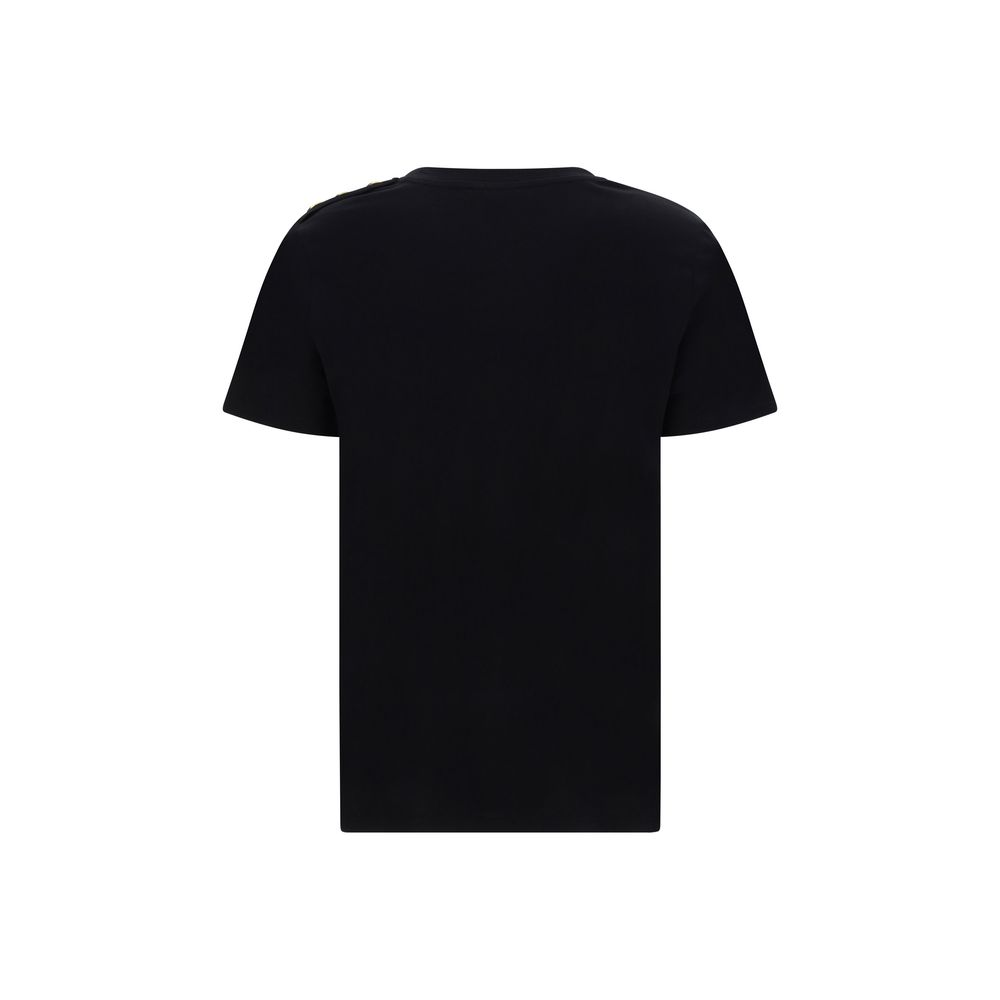 Back view of Balmain Black Cotton T-Shirt with iconic monogram, ribbed crew neck, and embossed shoulder buttons. Minimalist design.