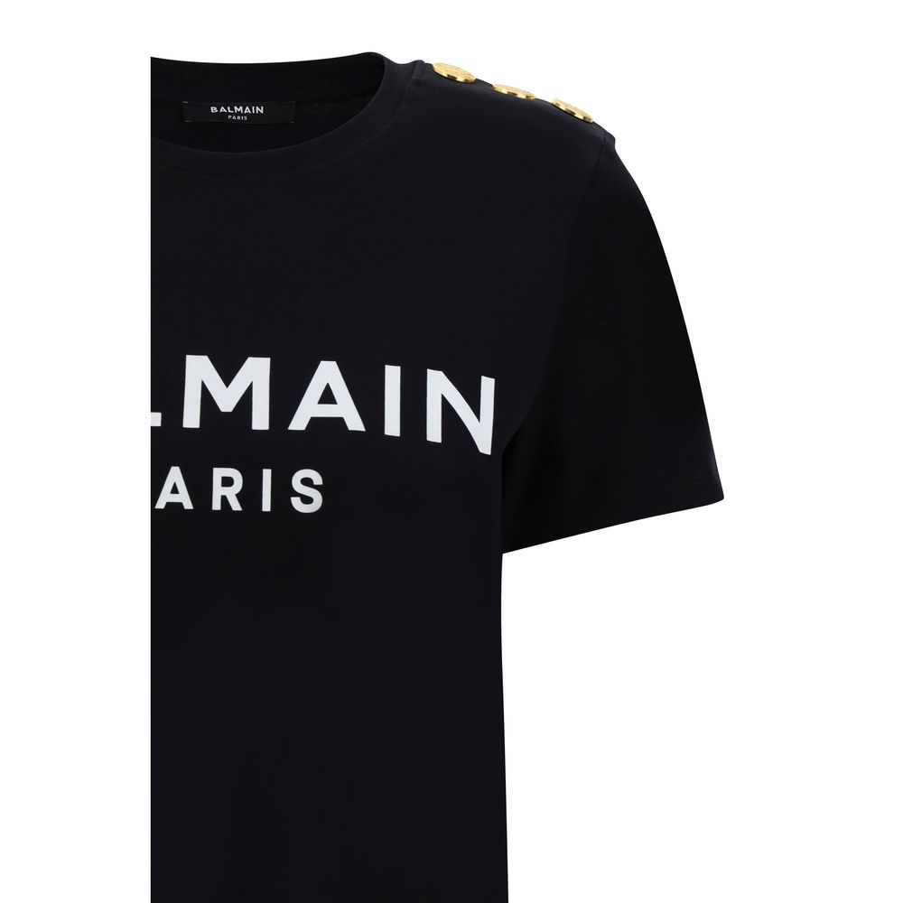 Balmain Black Cotton T-Shirt with monogram and embossed buttons, featuring ribbed crew neck, shown in front view.