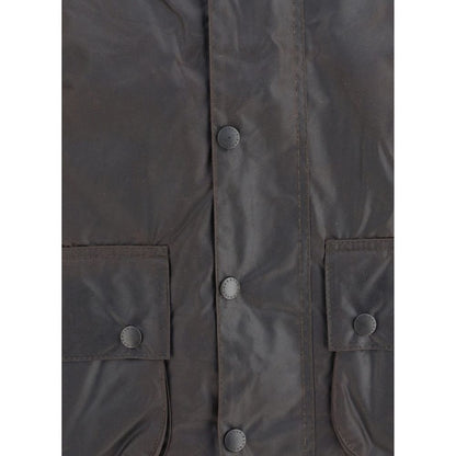 Close-up of Barbour Black Cotton Coat showing buttons and pockets.