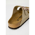 Close-up of Birkenstock Beige Synthetic Slipper with cork sole and double strap design for comfort and support