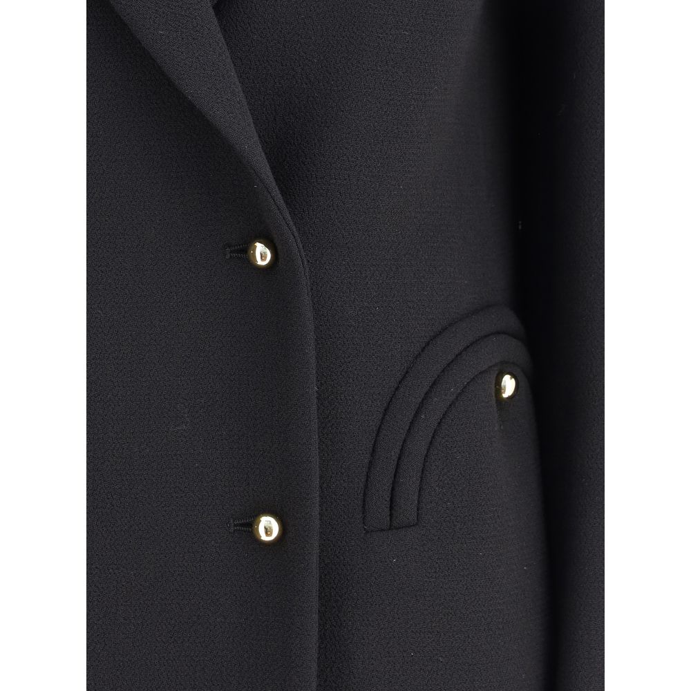 Close-up of Blazé Milano Black Fleece Wool Blazer with buttons and welt pocket detail