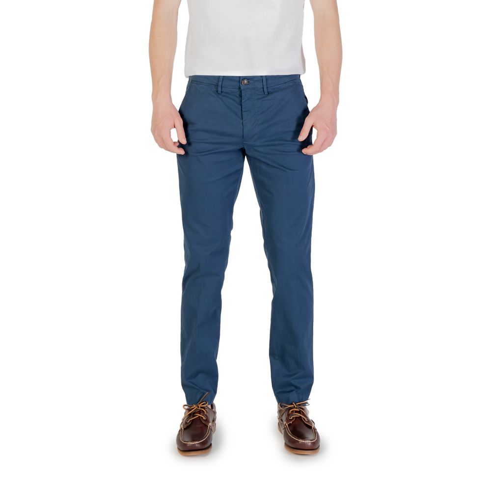 Man wearing Borghese Blue Cotton Skinny Pants with brown shoes and a white shirt showcasing slim fit design.