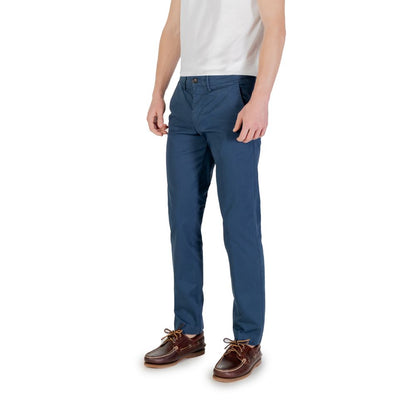 Man modeling Borghese Blue Cotton Skinny Pants, slim-fit for modern style and comfort, ideal for versatile casual and work wear.