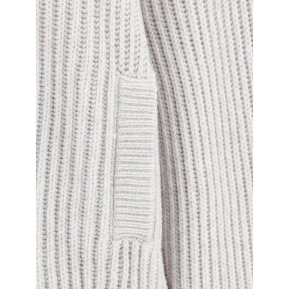 Close-up of Brunello Cucinelli White Cashmere Cardigan showcasing ribbed texture and welt pocket detail.