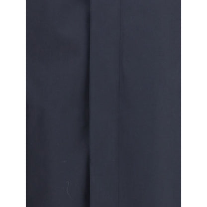 Close-up of Burberry Blue Cotton Coat fabric texture in navy color, showcasing high-quality craftsmanship and signature style details.