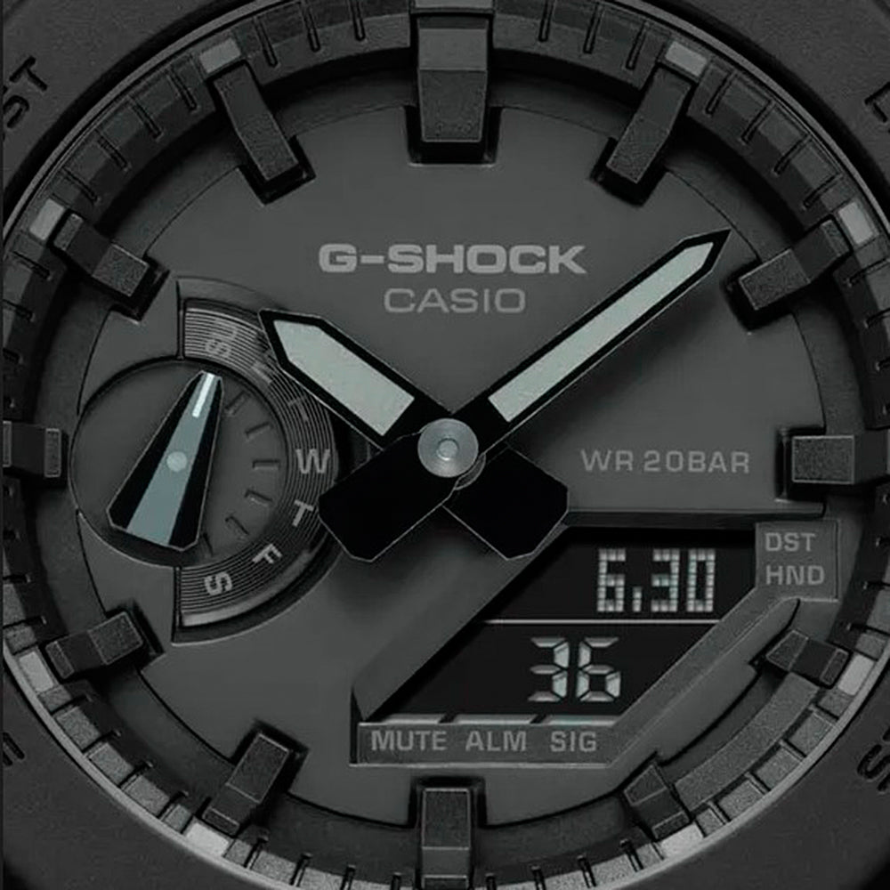Close-up of CASIO G-SHOCK Mod. OAK - ALL BLACK watch face with multifunction dials and quartz movement, emphasizes water resistance and durability.