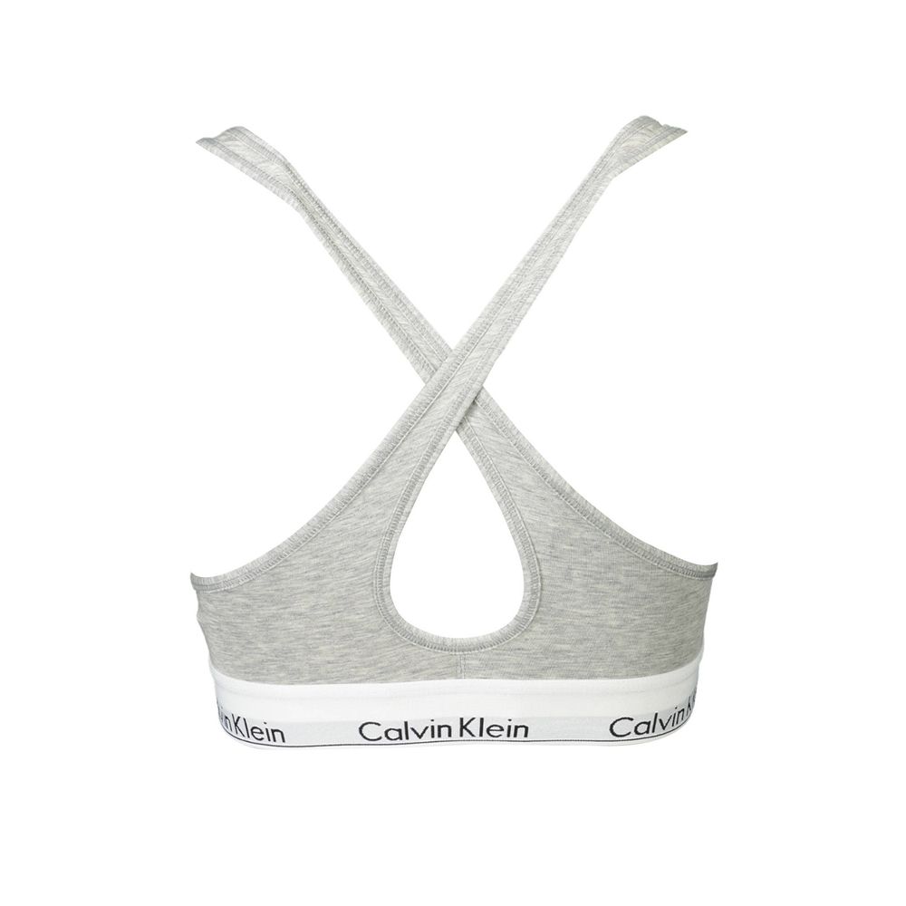 Back view of Calvin Klein Brown Cotton Women Bralette with chic crossed straps and elastic band featuring logo.