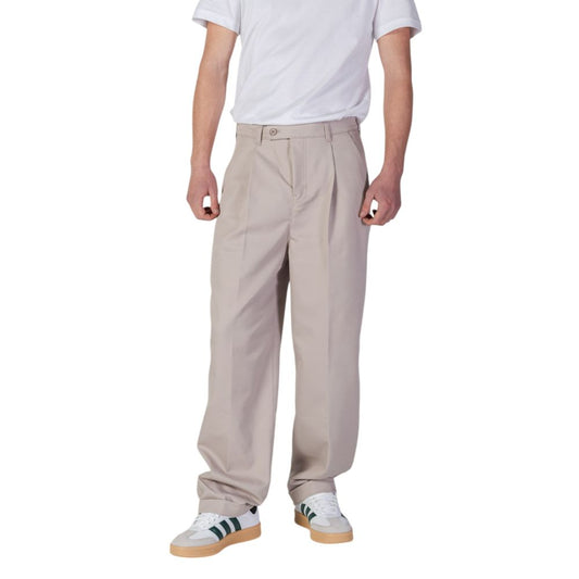 Calvin Klein Jeans Beige Recycled Polyester Casual Pants, regular fit, featuring central crease, worn by model with white sneakers.