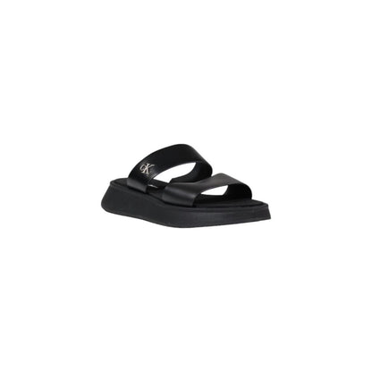 Calvin Klein Jeans Black Leather Flat Sandals with minimalist design and logo detail, ideal for summer fashion and versatile wear.