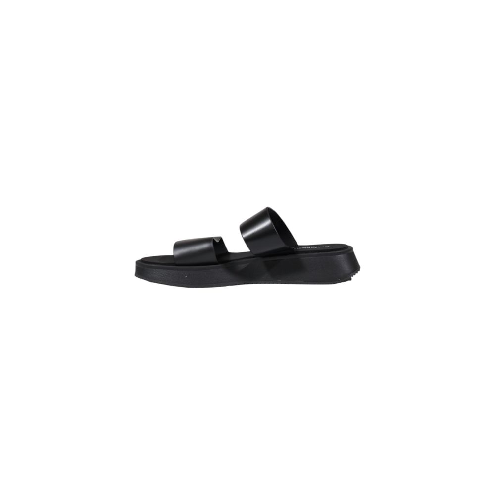 Calvin Klein Jeans Black Leather Flat Sandals featuring a minimalist design and durable sole for comfort and style.